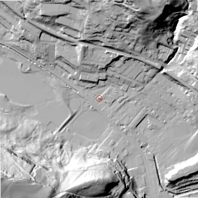 Shaded relief map of the ground around OL145HY, computed from Environment Agency LiDAR. The ground here sits at about 127 m above sea level and falls 107 m across the surrounding 800 m. Surface water reaching this point runs off ground lying to the north, 39.2 m higher.