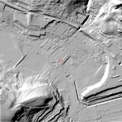 Shaded relief map of the ground around OL145LE, computed from Environment Agency LiDAR. The ground here sits at about 127 m above sea level and falls 92 m across the surrounding 800 m. Surface water reaching this point runs off ground lying to the north, 4.5 m higher.