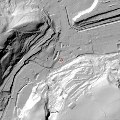 Shaded relief map of the ground around OL145PU, computed from Environment Agency LiDAR. The ground here sits at about 127 m above sea level and falls 100 m across the surrounding 800 m. Surface water reaching this point runs off ground lying to the south-east, 94.8 m higher.