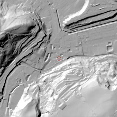 Shaded relief map of the ground around OL145PX, computed from Environment Agency LiDAR. The ground here sits at about 127 m above sea level and falls 99 m across the surrounding 800 m. Surface water reaching this point runs off ground lying to the south-east, 96.4 m higher.