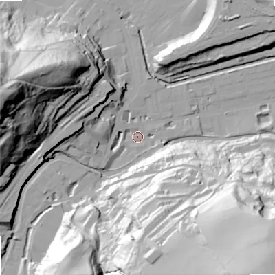 Shaded relief map of the ground around OL145QA, computed from Environment Agency LiDAR. The ground here sits at about 127 m above sea level and falls 98 m across the surrounding 800 m. Surface water reaching this point runs off ground lying to the south-east, 93.5 m higher.