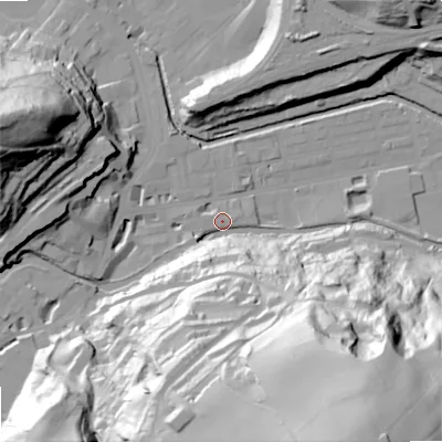 Shaded relief map of the ground around OL145QF, computed from Environment Agency LiDAR. The ground here sits at about 125 m above sea level and falls 98 m across the surrounding 800 m. Surface water reaching this point runs off ground lying to the south-south-east, 94.9 m higher.