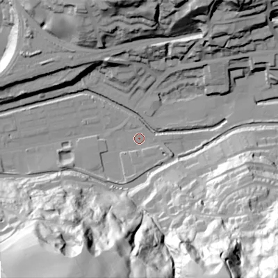 Shaded relief map of the ground around OL145QZ, computed from Environment Agency LiDAR. The ground here sits at about 123 m above sea level and falls 107 m across the surrounding 800 m. Surface water reaching this point runs off ground lying to the south-south-east, 99.4 m higher.