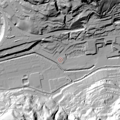Shaded relief map of the ground around OL145RP, computed from Environment Agency LiDAR. The ground here sits at about 124 m above sea level and falls 78 m across the surrounding 800 m. Surface water reaching this point runs off ground lying to the north-north-east, 72.8 m higher.