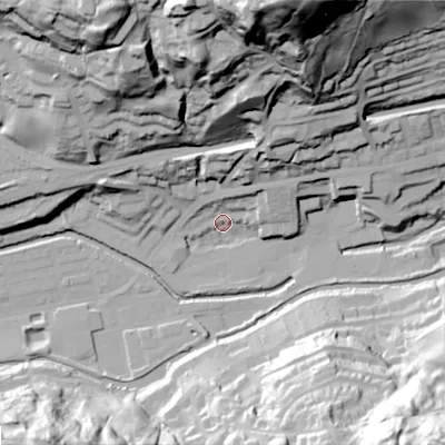 Shaded relief map of the ground around OL145RU, computed from Environment Agency LiDAR. The ground here sits at about 124 m above sea level and falls 103 m across the surrounding 800 m. Surface water reaching this point runs off ground lying to the north-north-east, 100.9 m higher.