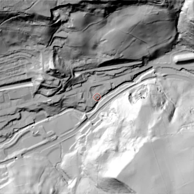 Shaded relief map of the ground around OL145RW, computed from Environment Agency LiDAR. The ground here sits at about 123 m above sea level and falls 117 m across the surrounding 800 m. Surface water reaching this point runs off ground lying to the south-south-east, 100.1 m higher.