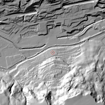 Shaded relief map of the ground around OL146AG, computed from Environment Agency LiDAR. The ground here sits at about 130 m above sea level and falls 108 m across the surrounding 800 m. Surface water reaching this point runs off ground lying to the south, 15.3 m higher.