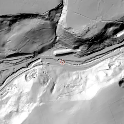 Shaded relief map of the ground around OL146BX, computed from Environment Agency LiDAR. The ground here sits at about 117 m above sea level and falls 109 m across the surrounding 800 m. Surface water reaching this point runs off ground lying to the south-south-east, 100.2 m higher.
