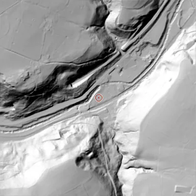 Shaded relief map of the ground around OL146DA, computed from Environment Agency LiDAR. The ground here sits at about 116 m above sea level and falls 103 m across the surrounding 800 m. Surface water reaching this point runs off ground lying to the south-south-west, 100.2 m higher.