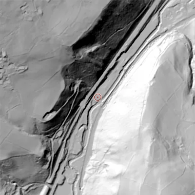 Shaded relief map of the ground around OL146DP, computed from Environment Agency LiDAR. The ground here sits at about 113 m above sea level and falls 153 m across the surrounding 800 m. Surface water reaching this point runs off ground lying to the north-west, 152.1 m higher.