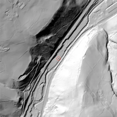 Shaded relief map of the ground around OL146EF, computed from Environment Agency LiDAR. The ground here sits at about 112 m above sea level and falls 155 m across the surrounding 800 m. Surface water reaching this point runs off ground lying to the north-west, 154.0 m higher.