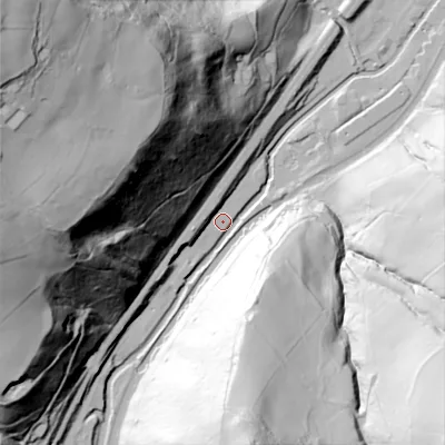 Shaded relief map of the ground around OL146EG, computed from Environment Agency LiDAR. The ground here sits at about 113 m above sea level and falls 157 m across the surrounding 800 m. Surface water reaching this point runs off ground lying to the south-east, 110.8 m higher.