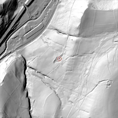 Shaded relief map of the ground around OL146EJ, computed from Environment Agency LiDAR. The ground here sits at about 173 m above sea level and falls 203 m across the surrounding 800 m. Surface water reaching this point runs off ground lying to the south-east, 142.0 m higher.