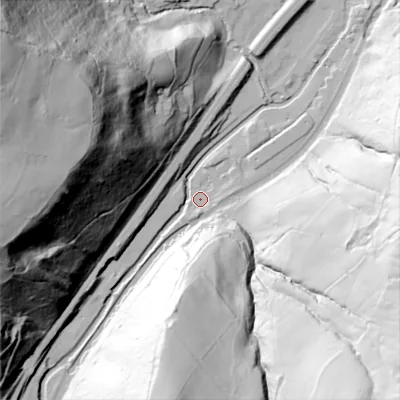 Shaded relief map of the ground around OL146EQ, computed from Environment Agency LiDAR. The ground here sits at about 111 m above sea level and falls 140 m across the surrounding 800 m. Surface water reaching this point runs off ground lying to the west-north-west, 127.2 m higher.