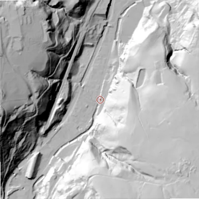 Shaded relief map of the ground around OL146NU, computed from Environment Agency LiDAR. The ground here sits at about 134 m above sea level and falls 105 m across the surrounding 800 m. Surface water reaching this point runs off ground lying to the south-east, 88.5 m higher.