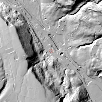 Shaded relief map of the ground around OL146TY, computed from Environment Agency LiDAR. The ground here sits at about 172 m above sea level and falls 127 m across the surrounding 800 m. Surface water reaching this point runs off ground lying to the south-south-west, 107.2 m higher.
