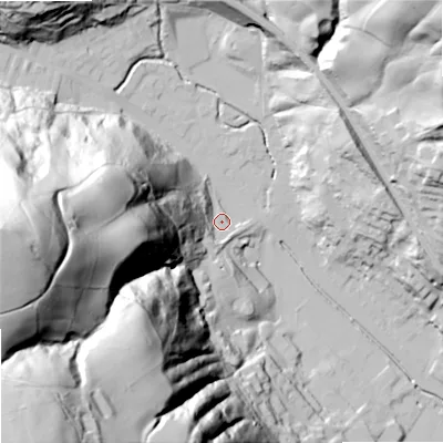 Shaded relief map of the ground around OL147DJ, computed from Environment Agency LiDAR. The ground here sits at about 138 m above sea level and falls 155 m across the surrounding 800 m. Surface water reaching this point runs off ground lying to the west-south-west, 86.1 m higher.