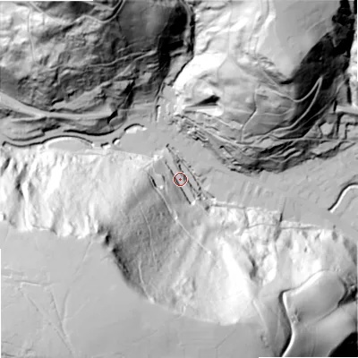 Shaded relief map of the ground around OL147DX, computed from Environment Agency LiDAR. The ground here sits at about 153 m above sea level and falls 190 m across the surrounding 800 m. Surface water reaching this point runs off ground lying to the south-west, 168.5 m higher.