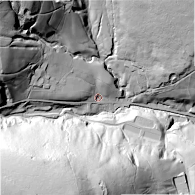 Shaded relief map of the ground around OL147HN, computed from Environment Agency LiDAR. The ground here sits at about 238 m above sea level and falls 130 m across the surrounding 800 m. Surface water reaching this point runs off ground lying to the west-north-west, 77.0 m higher.
