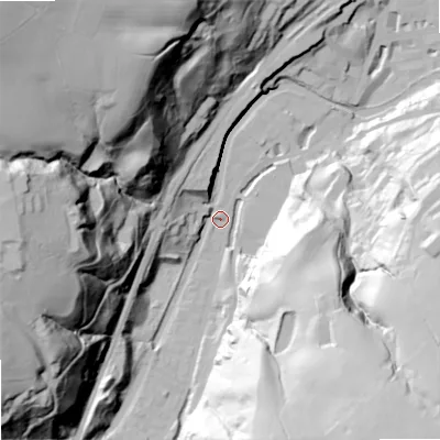 Shaded relief map of the ground around OL147LX, computed from Environment Agency LiDAR. The ground here sits at about 131 m above sea level and falls 114 m across the surrounding 800 m. Surface water reaching this point runs off ground lying to the west, 88.6 m higher.