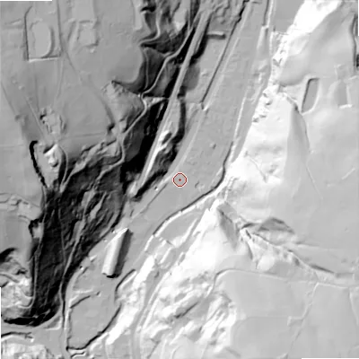 Shaded relief map of the ground around OL147NX, computed from Environment Agency LiDAR. The ground here sits at about 135 m above sea level and falls 123 m across the surrounding 800 m. Surface water reaching this point runs off ground lying to the west-north-west, 117.7 m higher.