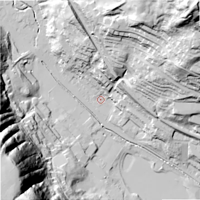 Shaded relief map of the ground around OL148EB, computed from Environment Agency LiDAR. The ground here sits at about 131 m above sea level and falls 133 m across the surrounding 800 m. Surface water reaching this point runs off ground lying to the north-east, 116.6 m higher.