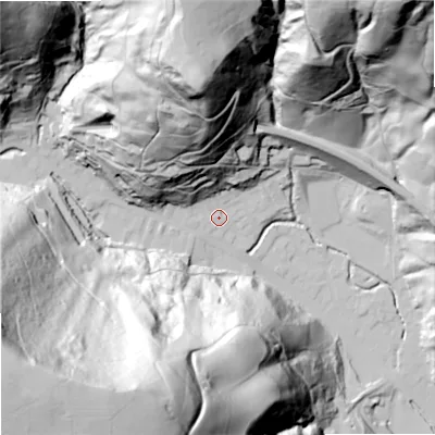 Shaded relief map of the ground around OL148EZ, computed from Environment Agency LiDAR. The ground here sits at about 143 m above sea level and falls 167 m across the surrounding 800 m. Surface water reaching this point runs off ground lying to the north, 103.4 m higher.