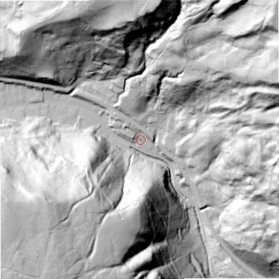 Shaded relief map of the ground around OL148JR, computed from Environment Agency LiDAR. The ground here sits at about 180 m above sea level and falls 152 m across the surrounding 800 m. Surface water reaching this point runs off ground lying to the south-west, 134.8 m higher.