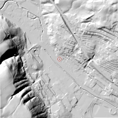 Shaded relief map of the ground around OL148LG, computed from Environment Agency LiDAR. The ground here sits at about 133 m above sea level and falls 139 m across the surrounding 800 m. Surface water reaching this point runs off ground lying to the west, 90.1 m higher.