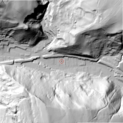 Shaded relief map of the ground around OL148LY, computed from Environment Agency LiDAR. The ground here sits at about 185 m above sea level and falls 144 m across the surrounding 800 m. Surface water reaching this point runs off ground lying to the north, 35.5 m higher.