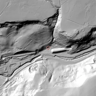 Shaded relief map of the ground around OL148SP, computed from Environment Agency LiDAR. The ground here sits at about 121 m above sea level and falls 118 m across the surrounding 800 m. Surface water reaching this point runs off ground lying to the north-west, 113.0 m higher.
