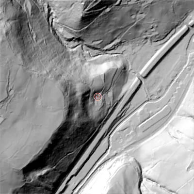 Shaded relief map of the ground around OL148ST, computed from Environment Agency LiDAR. The ground here sits at about 146 m above sea level and falls 156 m across the surrounding 800 m. Surface water reaching this point runs off ground lying to the west, 113.2 m higher.