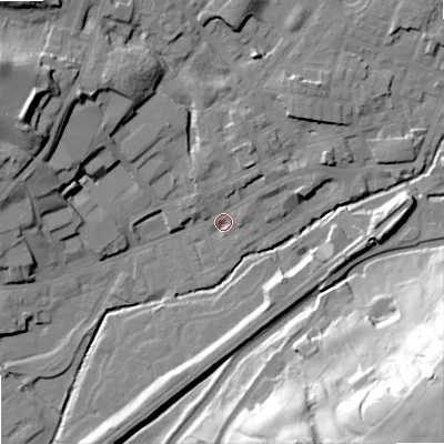 Shaded relief map of the ground around OL158AA, computed from Environment Agency LiDAR. The ground here sits at about 142 m above sea level and falls 66 m across the surrounding 800 m. Surface water reaching this point runs off ground lying to the north-north-east, 7.7 m higher.