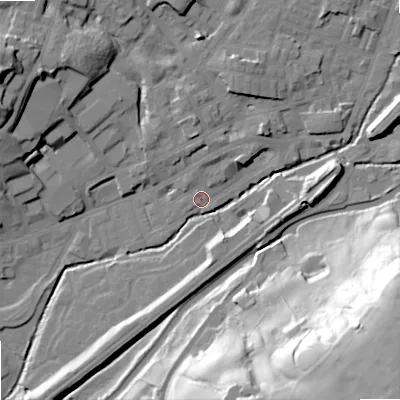 Shaded relief map of the ground around OL158AQ, computed from Environment Agency LiDAR. The ground here sits at about 143 m above sea level and falls 69 m across the surrounding 800 m. Surface water reaching this point runs off ground lying to the north-east, 6.3 m higher.