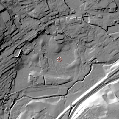 Shaded relief map of the ground around OL158DP, computed from Environment Agency LiDAR. The ground here sits at about 137 m above sea level and falls 47 m across the surrounding 800 m. Surface water reaching this point runs off ground lying to the north-west, 38.0 m higher.