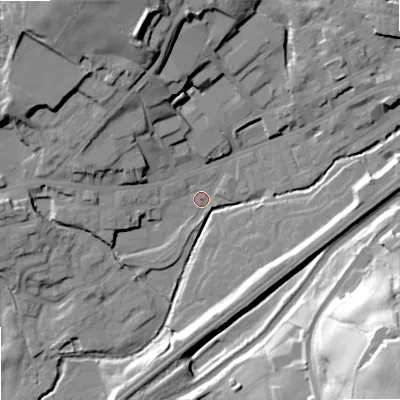 Shaded relief map of the ground around OL158JG, computed from Environment Agency LiDAR. The ground here sits at about 140 m above sea level and falls 60 m across the surrounding 800 m. Surface water reaching this point runs off ground lying to the south-west, 2.9 m higher.