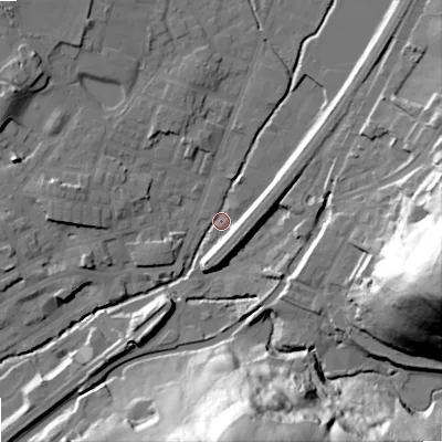Shaded relief map of the ground around OL159AS, computed from Environment Agency LiDAR. The ground here sits at about 143 m above sea level and falls 69 m across the surrounding 800 m. Surface water reaching this point runs off ground lying to the north-west, 10.8 m higher.