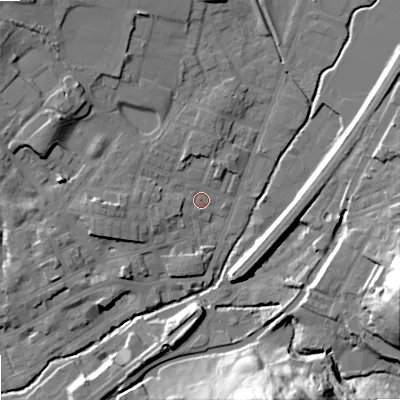 Shaded relief map of the ground around OL159DN, computed from Environment Agency LiDAR. The ground here sits at about 145 m above sea level and falls 42 m across the surrounding 800 m. Surface water reaching this point runs off ground lying to the west, 5.6 m higher.
