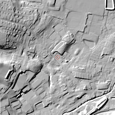 Shaded relief map of the ground around OL159HE, computed from Environment Agency LiDAR. The ground here sits at about 147 m above sea level and falls 33 m across the surrounding 800 m. Surface water reaching this point runs off ground lying to the north-west, 26.1 m higher.