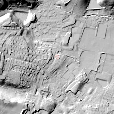 Shaded relief map of the ground around OL159HL, computed from Environment Agency LiDAR. The ground here sits at about 157 m above sea level and falls 51 m across the surrounding 800 m. Surface water reaching this point runs off ground lying to the north-west, 40.6 m higher.