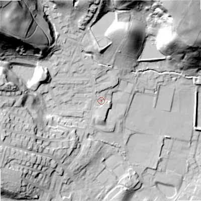 Shaded relief map of the ground around OL159JJ, computed from Environment Agency LiDAR. The ground here sits at about 159 m above sea level and falls 69 m across the surrounding 800 m. Surface water reaching this point runs off ground lying to the north-north-west, 2.9 m higher.