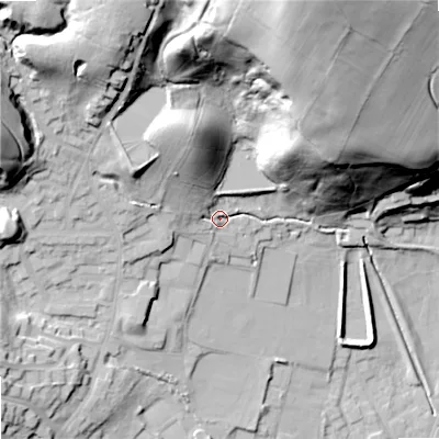 Shaded relief map of the ground around OL159JX, computed from Environment Agency LiDAR. The ground here sits at about 156 m above sea level and falls 74 m across the surrounding 800 m. Surface water reaching this point runs off ground lying to the north-north-west, 23.0 m higher.