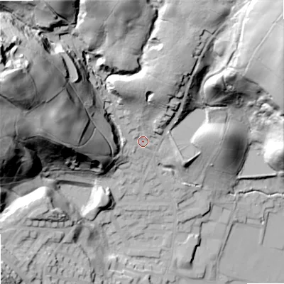 Shaded relief map of the ground around OL159JZ, computed from Environment Agency LiDAR. The ground here sits at about 168 m above sea level and falls 84 m across the surrounding 800 m. Surface water reaching this point runs off ground lying to the west-north-west, 67.1 m higher.