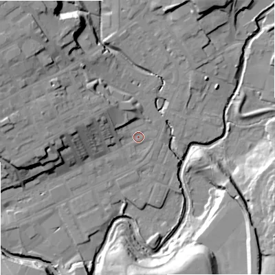 Shaded relief map of the ground around OL162HA, computed from Environment Agency LiDAR. The ground here sits at about 124 m above sea level and falls 24 m across the surrounding 800 m. Surface water reaching this point runs off ground lying to the west-north-west, 7.5 m higher.