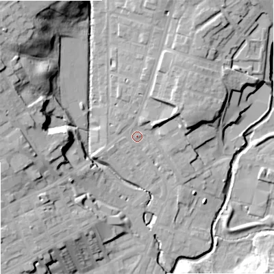 Shaded relief map of the ground around OL162LU, computed from Environment Agency LiDAR. The ground here sits at about 127 m above sea level and falls 29 m across the surrounding 800 m. Surface water reaching this point runs off ground lying to the east-north-east, 5.3 m higher.