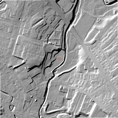 Shaded relief map of the ground around OL162UZ, computed from Environment Agency LiDAR. The ground here sits at about 124 m above sea level and falls 24 m across the surrounding 800 m. Surface water reaching this point runs off ground lying to the west-north-west, 12.1 m higher.