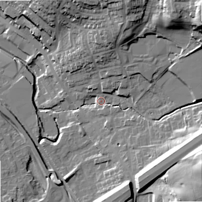 Shaded relief map of the ground around OL163NX, computed from Environment Agency LiDAR. The ground here sits at about 151 m above sea level and falls 41 m across the surrounding 800 m. Surface water reaching this point runs off ground lying to the north-east, 35.8 m higher.