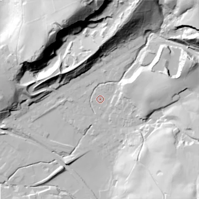 Shaded relief map of the ground around OL163SG, computed from Environment Agency LiDAR. The ground here sits at about 169 m above sea level and falls 81 m across the surrounding 800 m. Surface water reaching this point runs off ground lying to the east-north-east, 16.1 m higher.