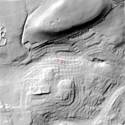 Shaded relief map of the ground around OL27PX, computed from Environment Agency LiDAR. The ground here sits at about 202 m above sea level and falls 65 m across the surrounding 800 m. Surface water reaching this point runs off ground lying to the south-west, 13.3 m higher.