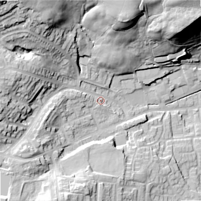 Shaded relief map of the ground around OL27YG, computed from Environment Agency LiDAR. The ground here sits at about 180 m above sea level and falls 46 m across the surrounding 800 m. Surface water reaching this point runs off ground lying to the north-west, 33.1 m higher.